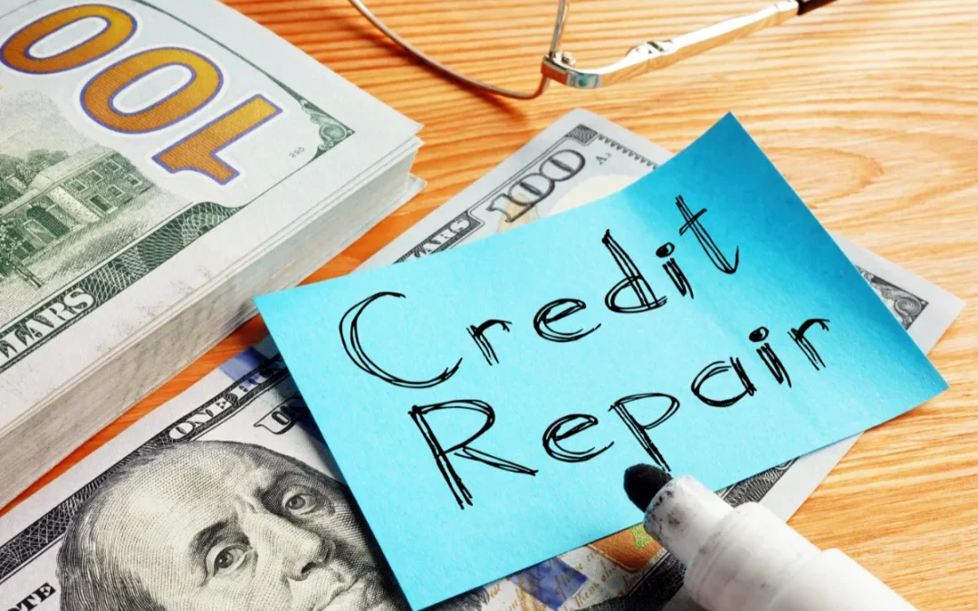 A note labeled "Credit Repair" with a marker, glasses, and cash on a table.